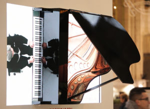 interactive floor piano extends from video into real space